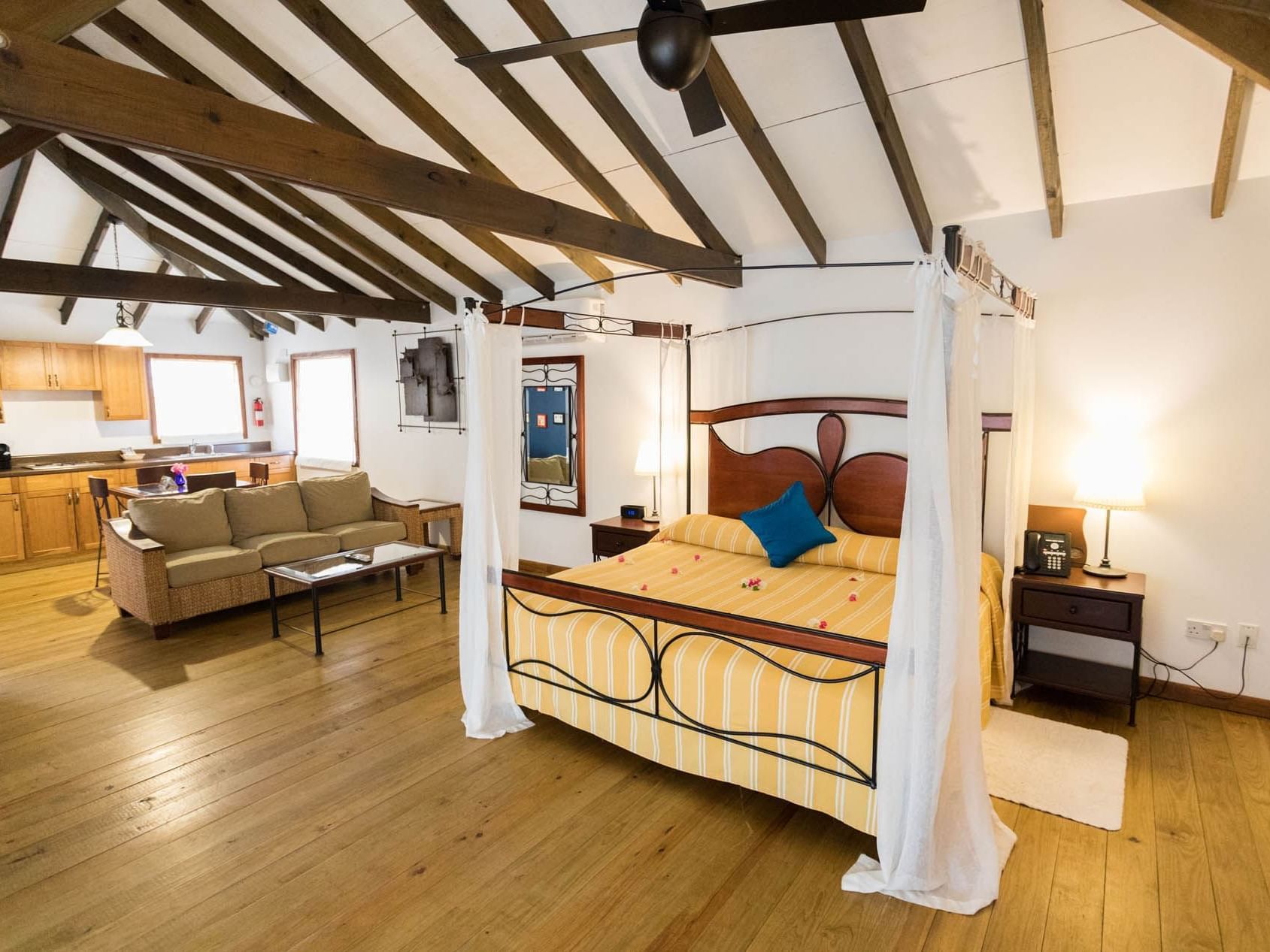 Canopy Bed & lounge in Tower Suites at True Blue Bay Resort