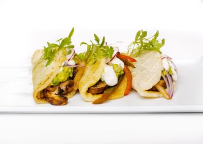 Three plated tacos served in a restaurant at Retreat Costa Rica