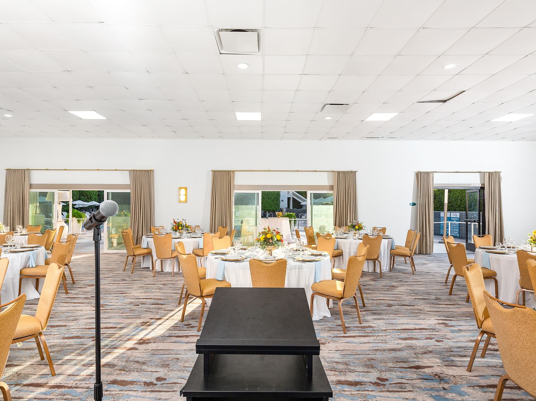 Meeting room with round tables at The Anaheim Hotel