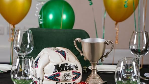 Balloons, baseball & football on a table, Novotel Glen Waverley