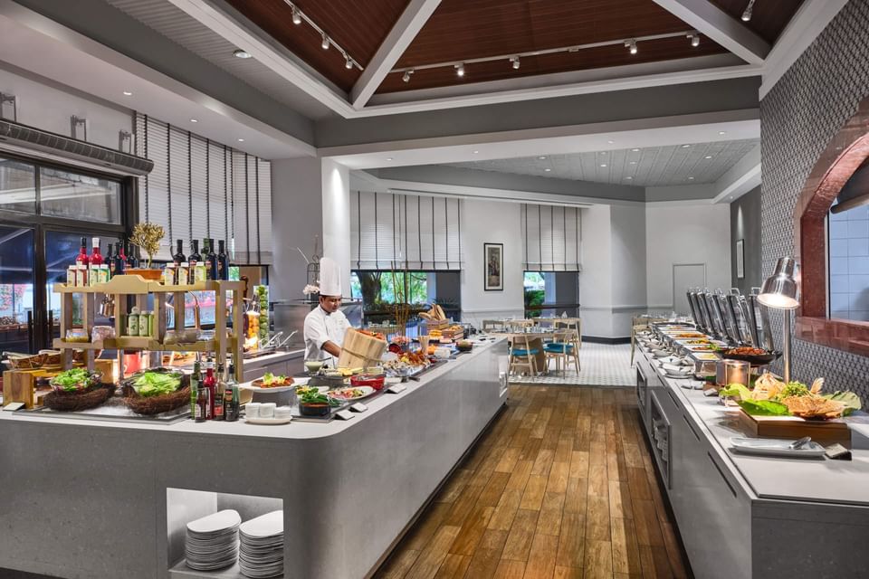 Chef in buffet of Ellenborough Market Cafe at Paradox Singapore