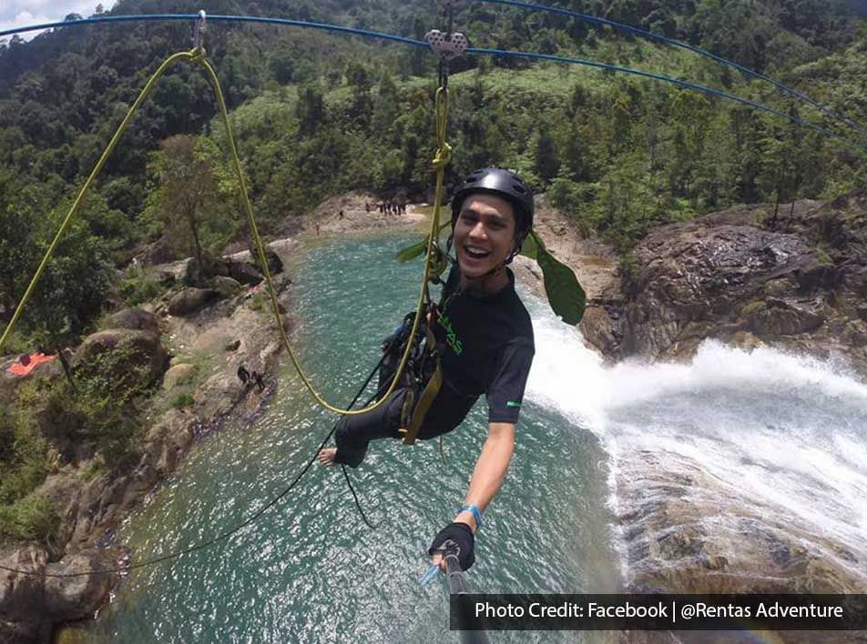 A man was taking a selfie while zip-lining through a waterfall - Lexis Suites Penang