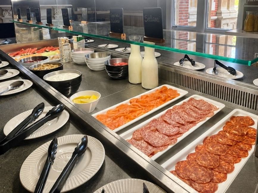 Breakfast buffet counter displaying smoked salmon, cold meats and continental items at Easthampstead Park Hotel in Bracknell