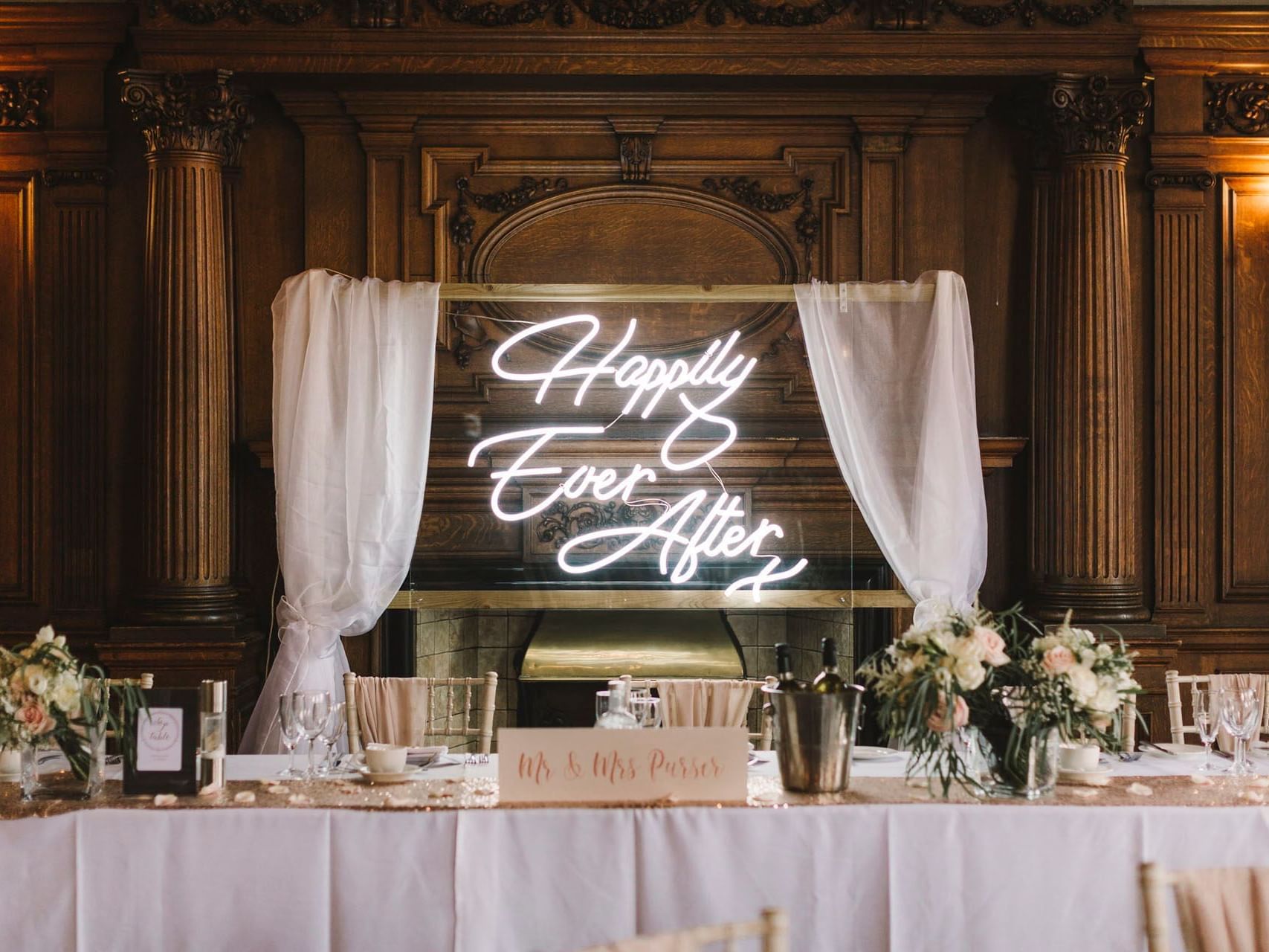 Arranged table set-up & neon sign in a wedding ceremony, wedding venues in York at The Milner York