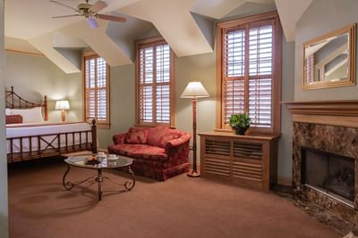 Fireplace & bed in Parlor Room at The Herrington Inn & Spa