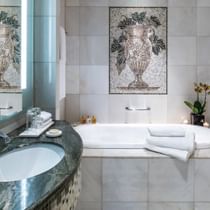 Vanity area with a bathtub in 
a Bathroom at Palazzo Versace