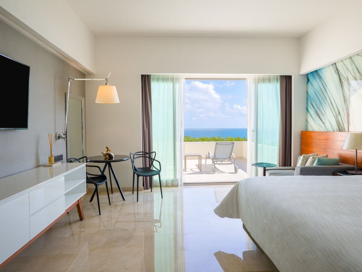 Premium Ocean Front with Terrace King bed and sitting area, TV at Live Aqua Beach Resort