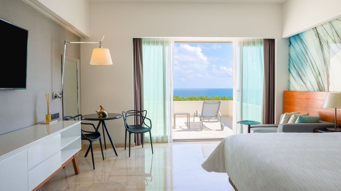 Premium Ocean Front with Terrace King bed and sitting area, TV at Live Aqua Beach Resort