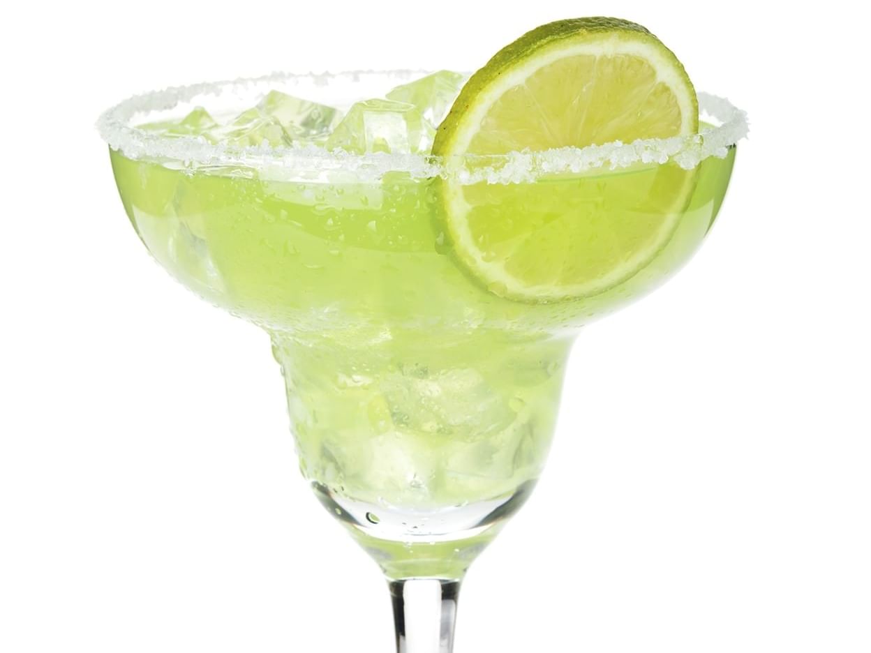 A cocktail glass of a Traditional Mexican Margarita served at Strahan Village