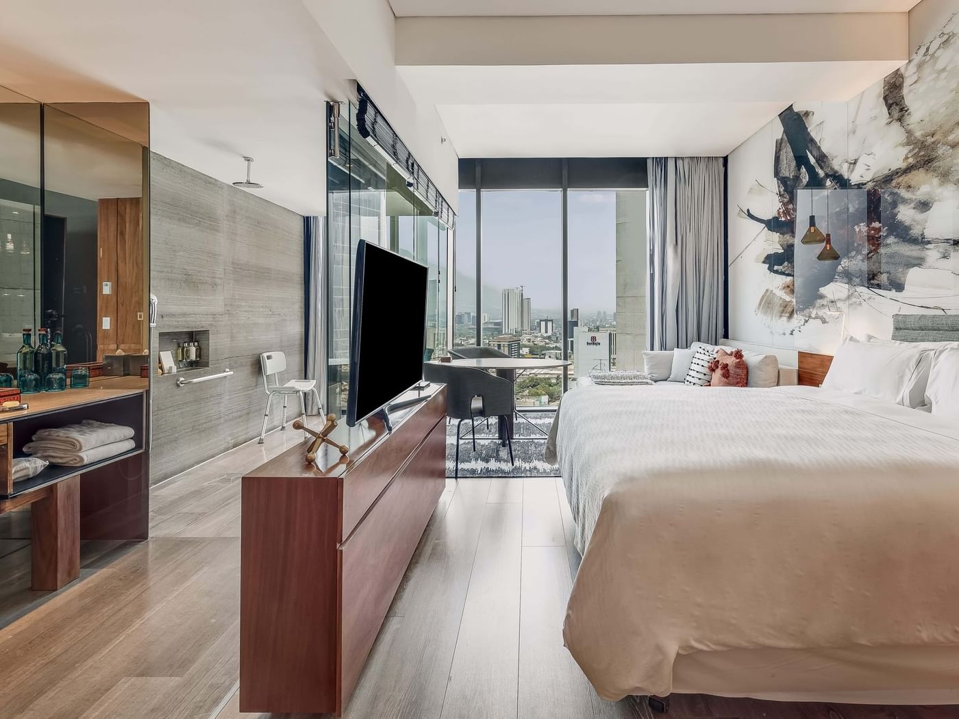 Modern interior of Accessible Room with bed and TV at FA Hotels & Resorts