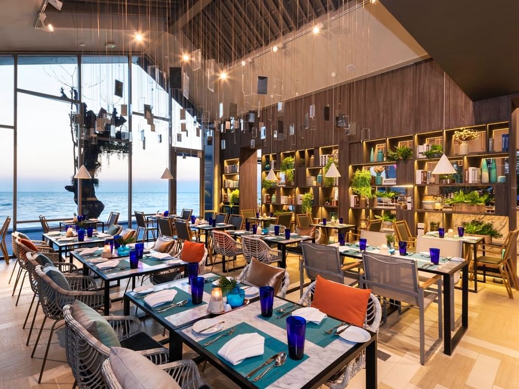 Dining area with ocean view at Salt Restaurant at U Hotels