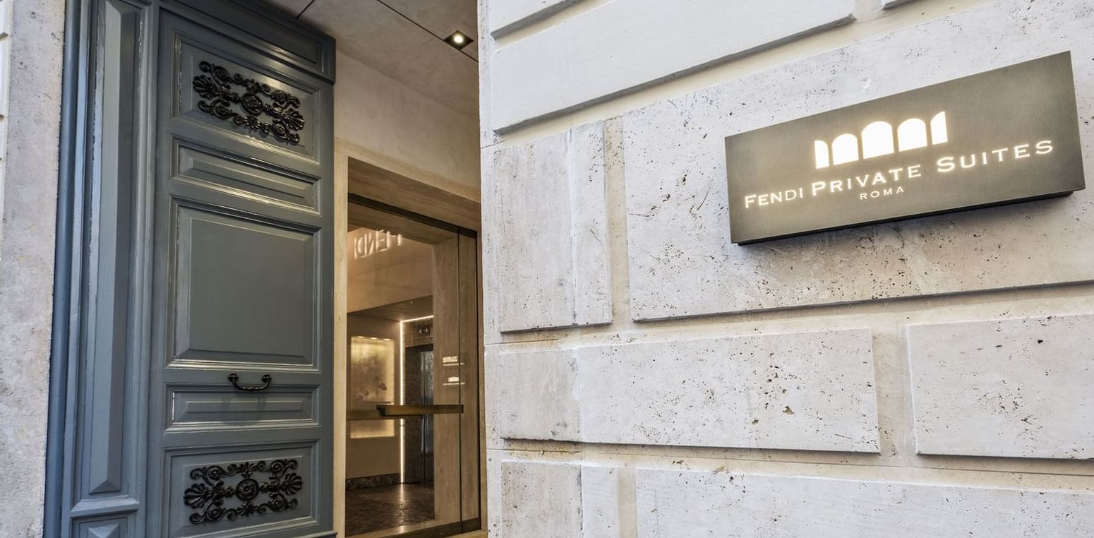 Hotel sign on the entrance wall to Fendi Private Suites