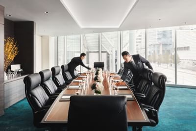 2 men's arranging a Yaletown Room at Paradox Hotel Vancouver