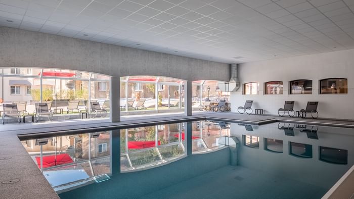 Spa with indoor pool area at The Originals hotels