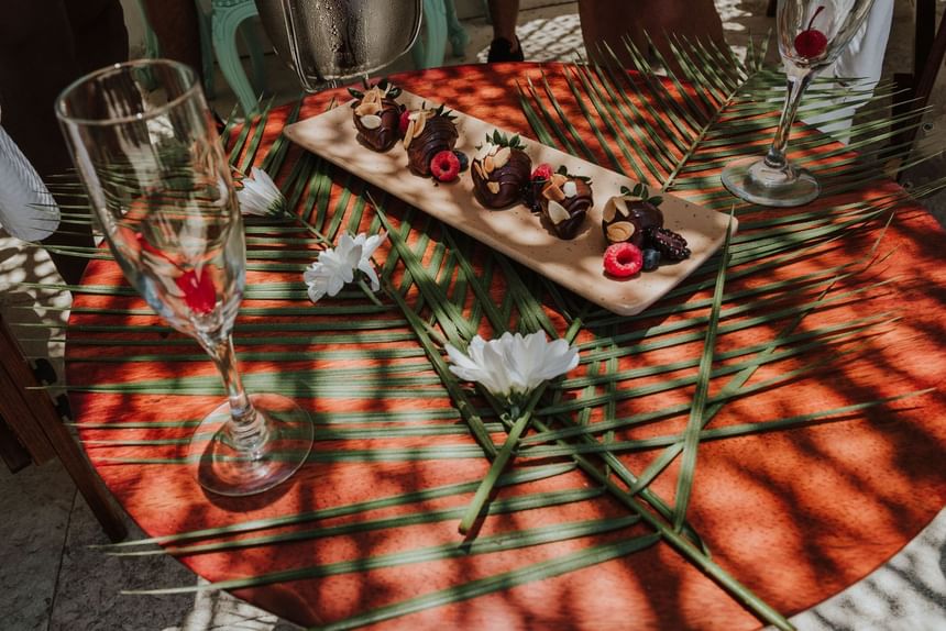 Dessert platter served on a table with glassware at Almar Beach Resort