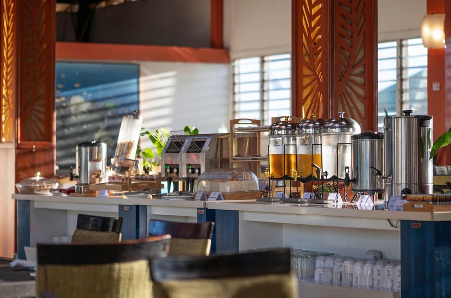 Buffet spread with beverages and pastries at Tokatoka Resort - Fiji International Airport.