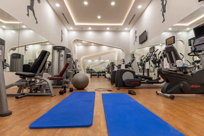 Yoga Mats, Chess Press and Elliptical in Fitness Gym in Sealine 