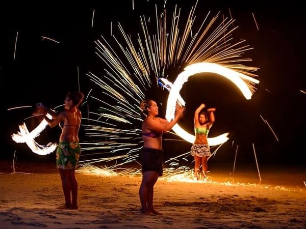 View of a fire dance performance at night in The Warwick Fiji
