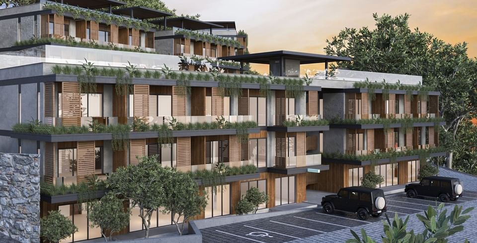 Modern BlueZone Residence with terraced floors, lush greenery, and a parking lot at A'ila Residences