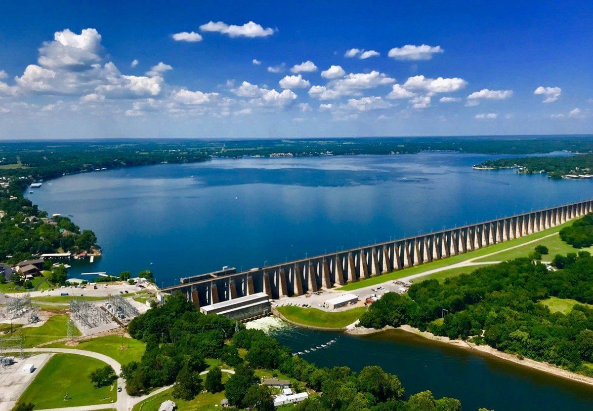 Aerial view of the large Pensacola Dam and Grand Lake O' the Cherokees near Shangri-La Monkey Island
