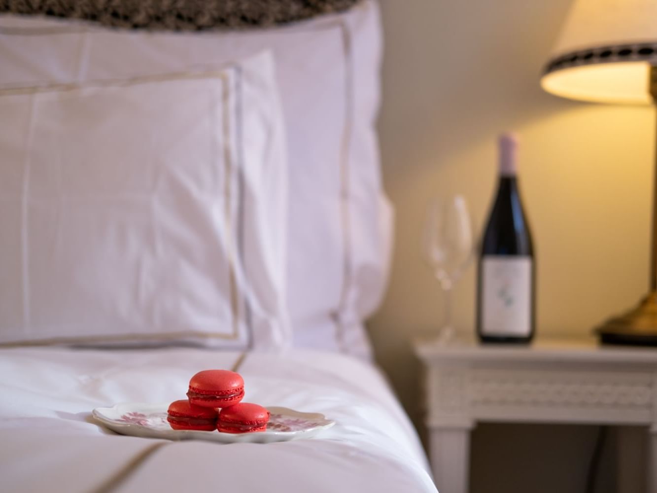 Macaroons served on a bed in a room at The Sparrow Hotel