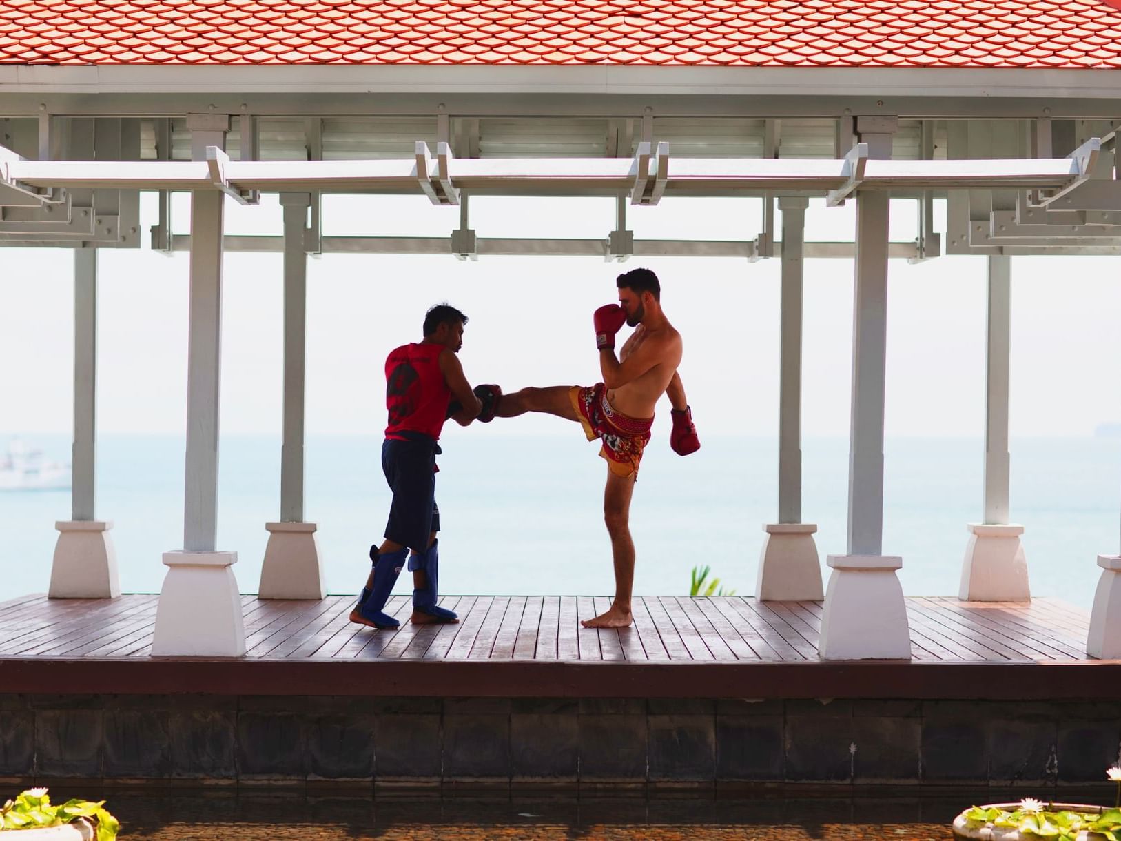 A male guest having a boxing training session