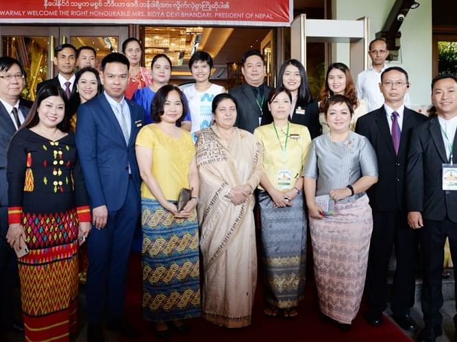 Staff posing at the entrance of Chatrium Royal Lake Yangon