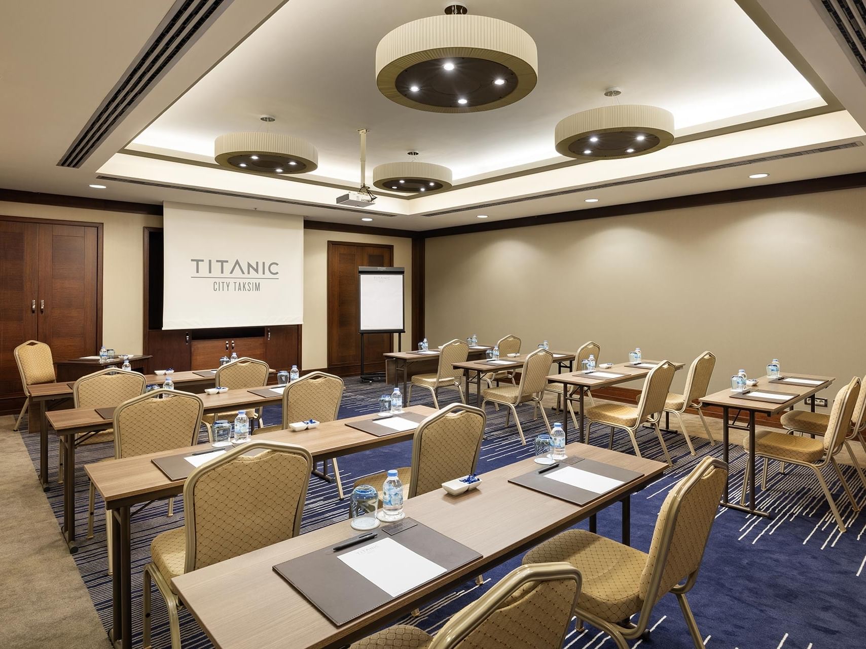 Borneo meeting room with classroom layout and a projector screen in Titanic City Taksim.