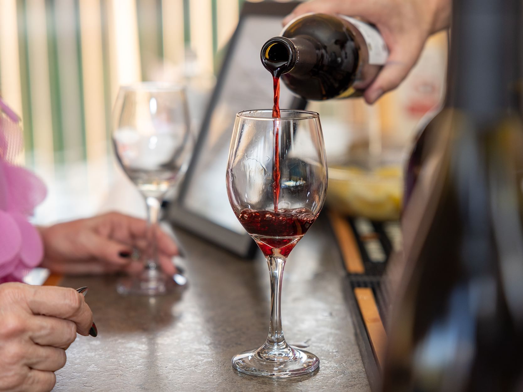 red wine being poured