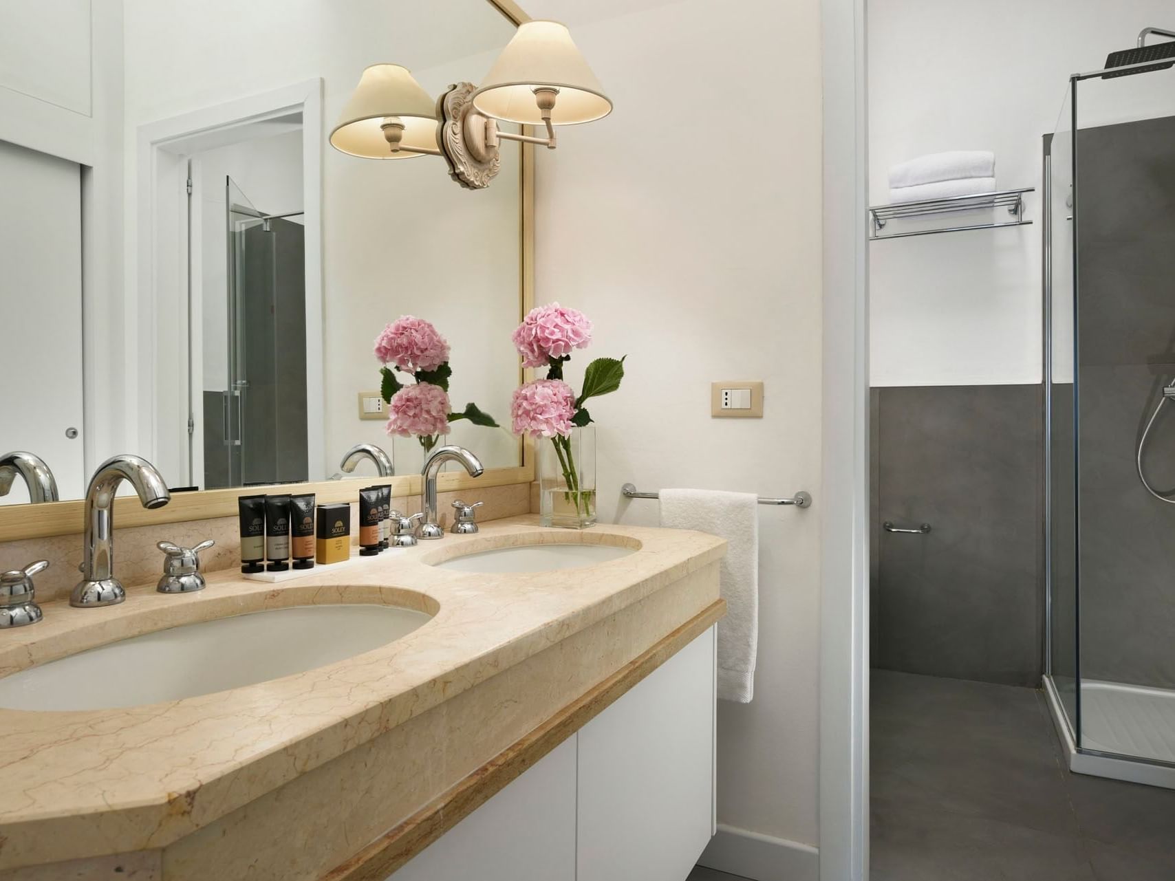 Bathroom vanity in Superior Room at Golf Hotel Punta Ala