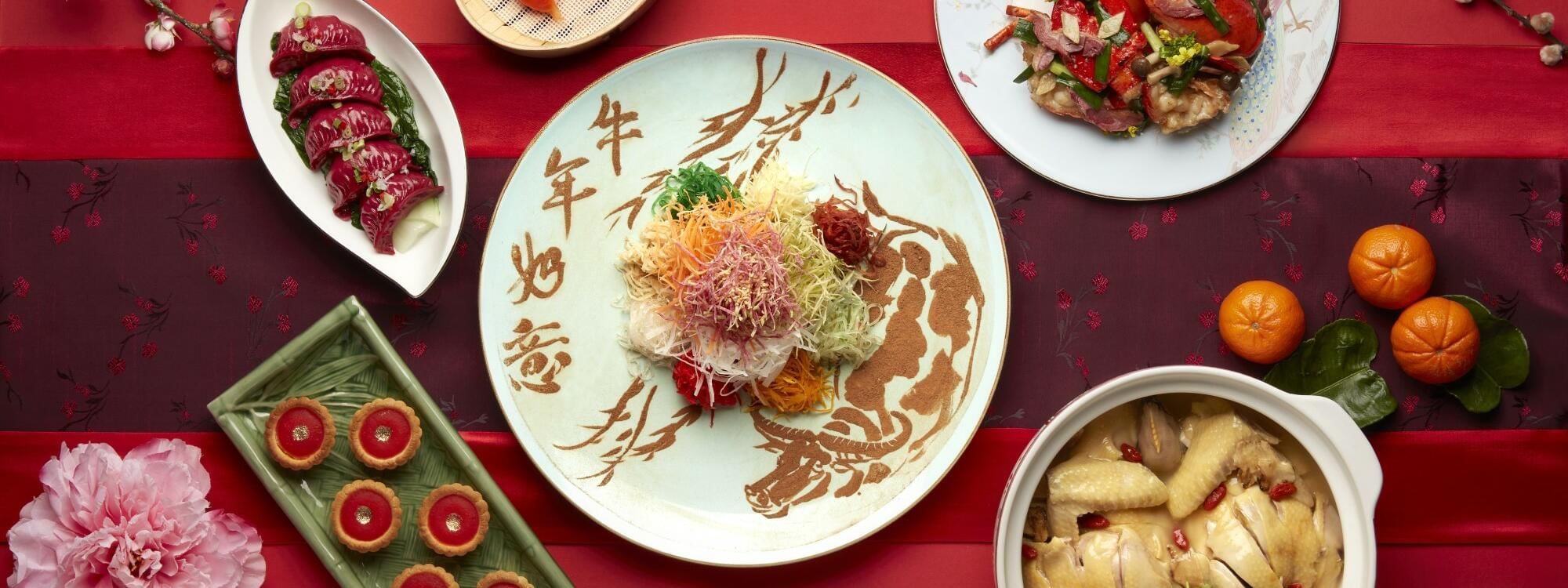 Close-up of Yusheng dish served at Fullerton Singapore