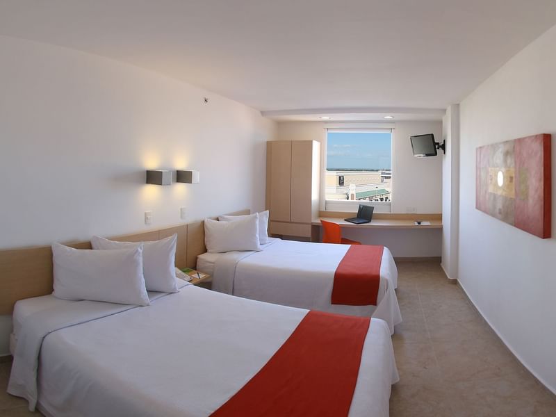 Habitación Doble Superior con ventanas abiertas en One Hotels