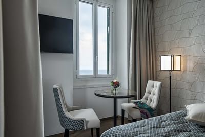 Sitting area by the windows at Sublimis Boutique Hotel Camogli