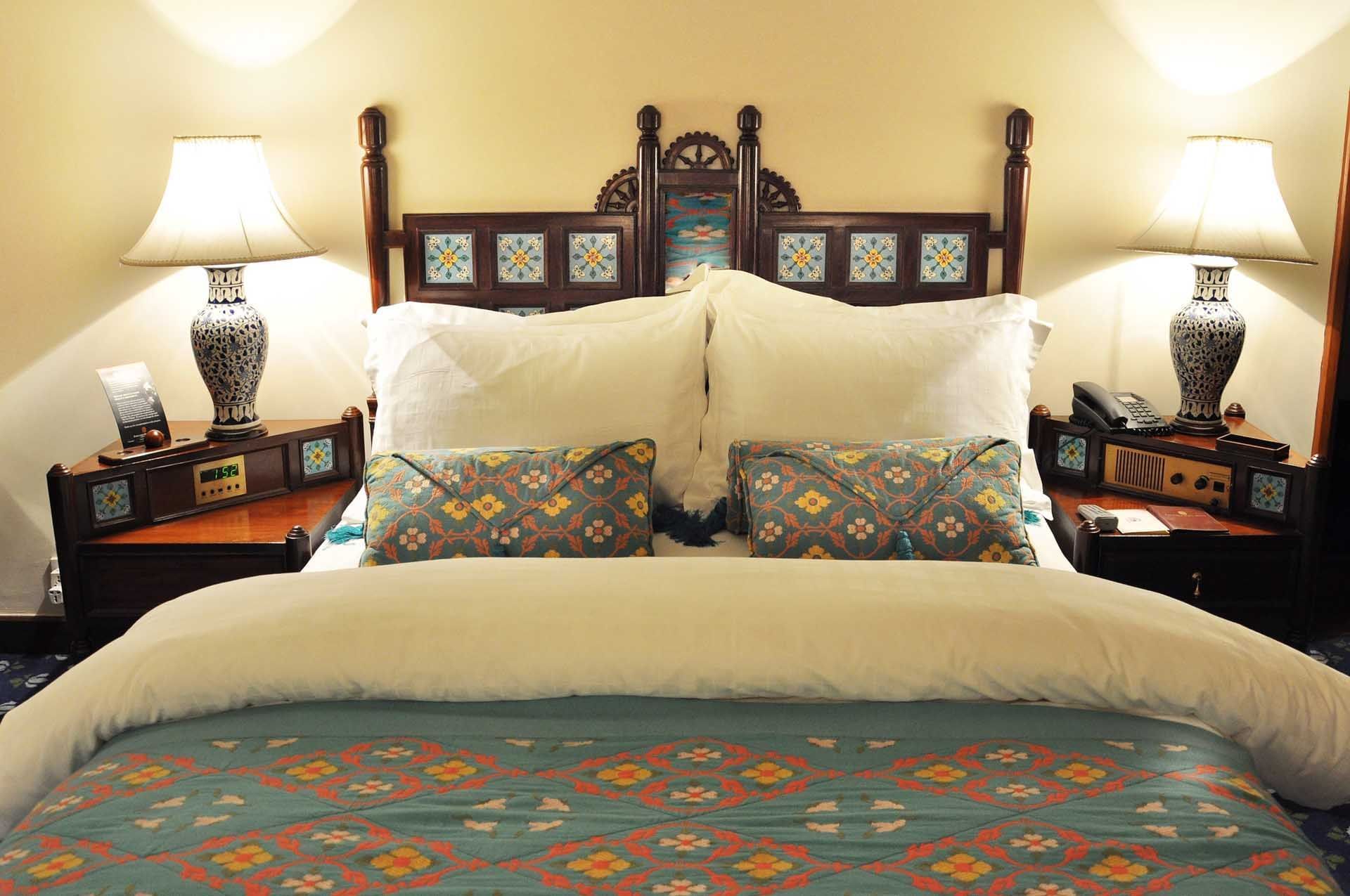 Queen bed in The Deluxe Room at Faisalabad Serena Hotel