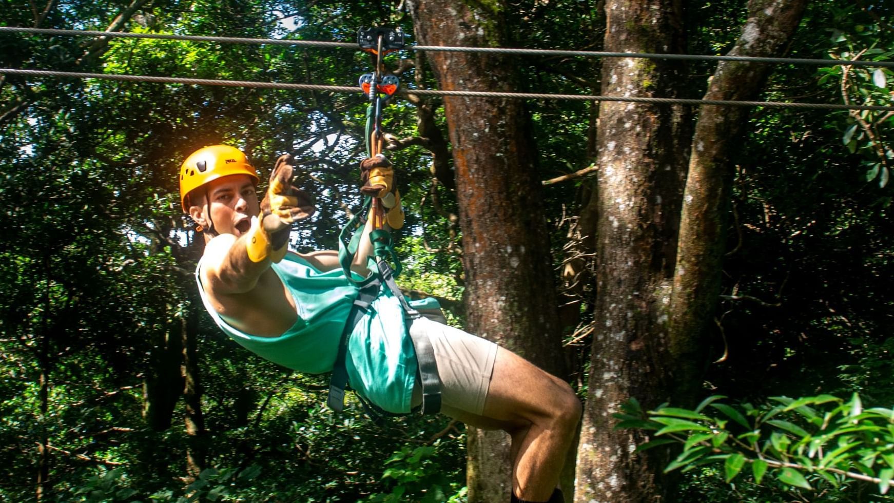 Man Zipping & posing for photo near Buena Vista Del Rincon