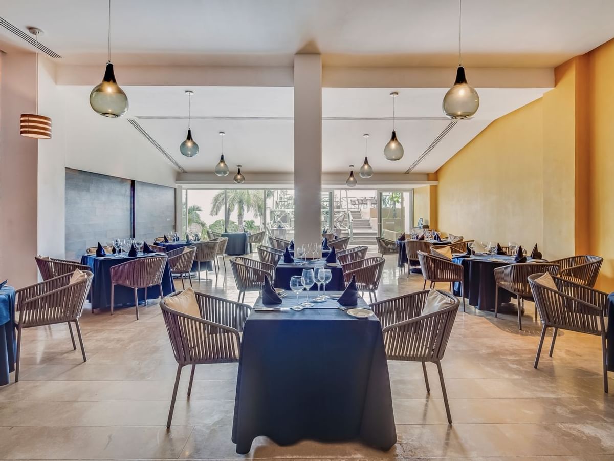 Dining area arranged in Rosato restaurant at FA Cozumel