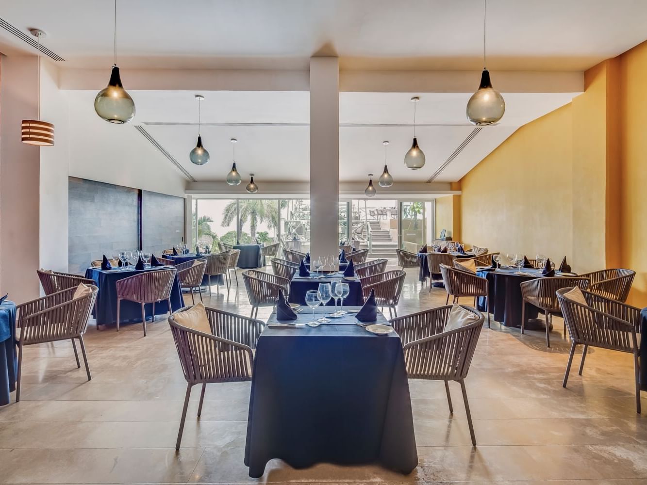 Rosato restaurant seating arrangements at  La Colección Resorts
