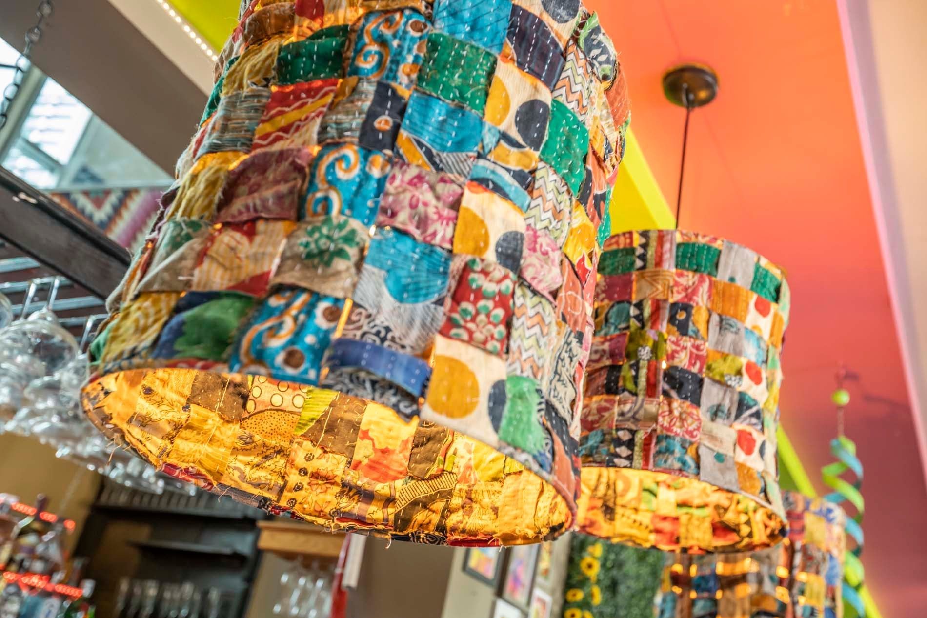 a colorful chandelier hangs from the ceiling