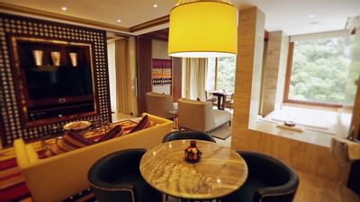 Living space in Imperial Suite with river view at Hotel Sumaq
