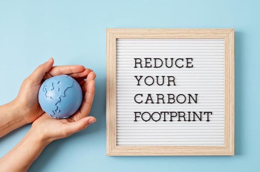 Carbon Neutral Britain featuring a sign with call to action