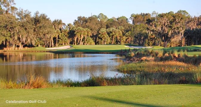 Golf course with a water hazard near Lake Buena Vista Resort Village & Spa