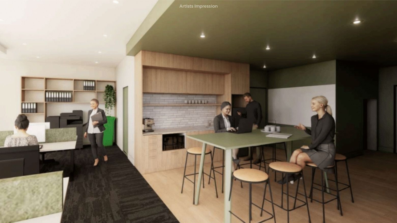 People in a modern office with desks, stools, a kitchen area, and shelves at UniLodge Brisbane City.