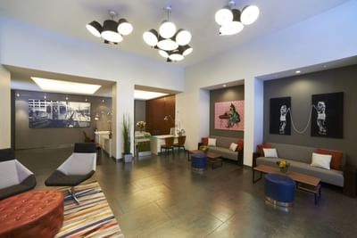 Seating arrangements & wall decors in the Lobby at Kinzie Hotel