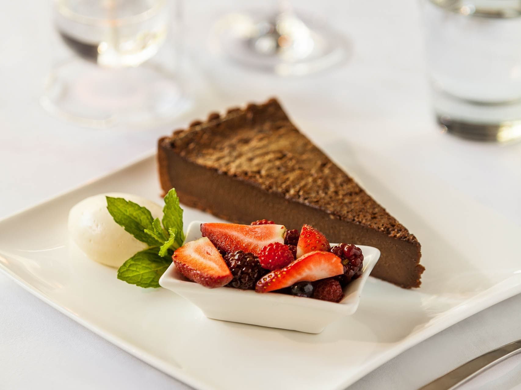 Close-up of Chocolate cake with strawberries at Hotel Grand Chancellor Melbourne