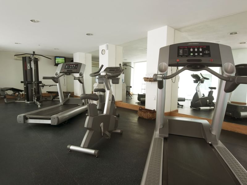 Exercise machines in Gym Wellness Center at Fiesta Inn Hotels