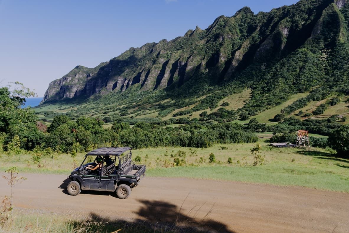 People riding ATV in Kualoa Ranch near Waikiki Resort Hotel
