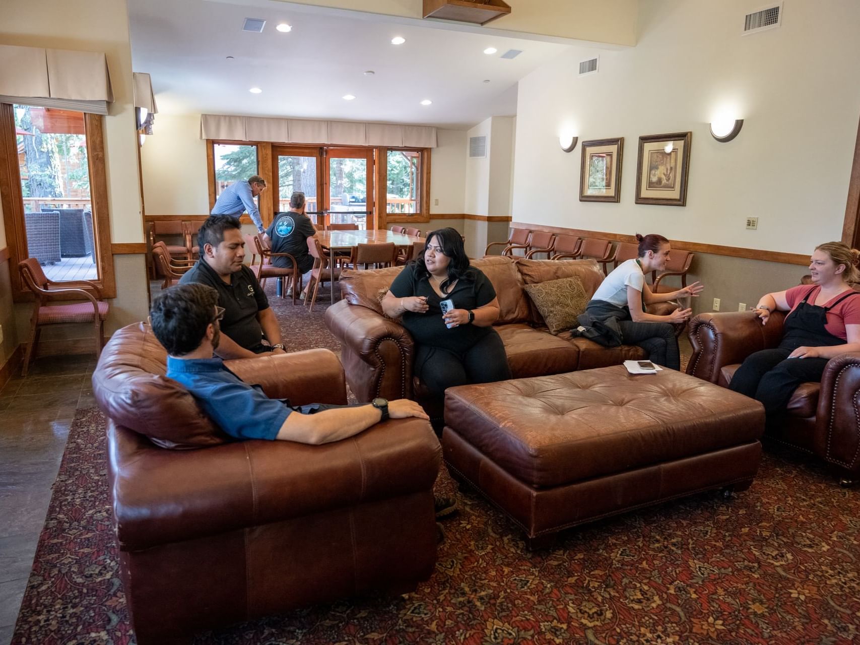 A group having a chat in Alder Room at Granlibakken Tahoe