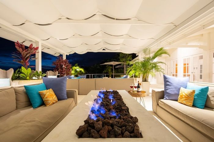 Lounge area with sofas and a fireplace at Retreat Costa Rica