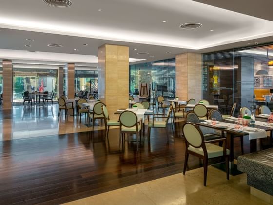 Interior of a restaurant dining area at Ana Hotels