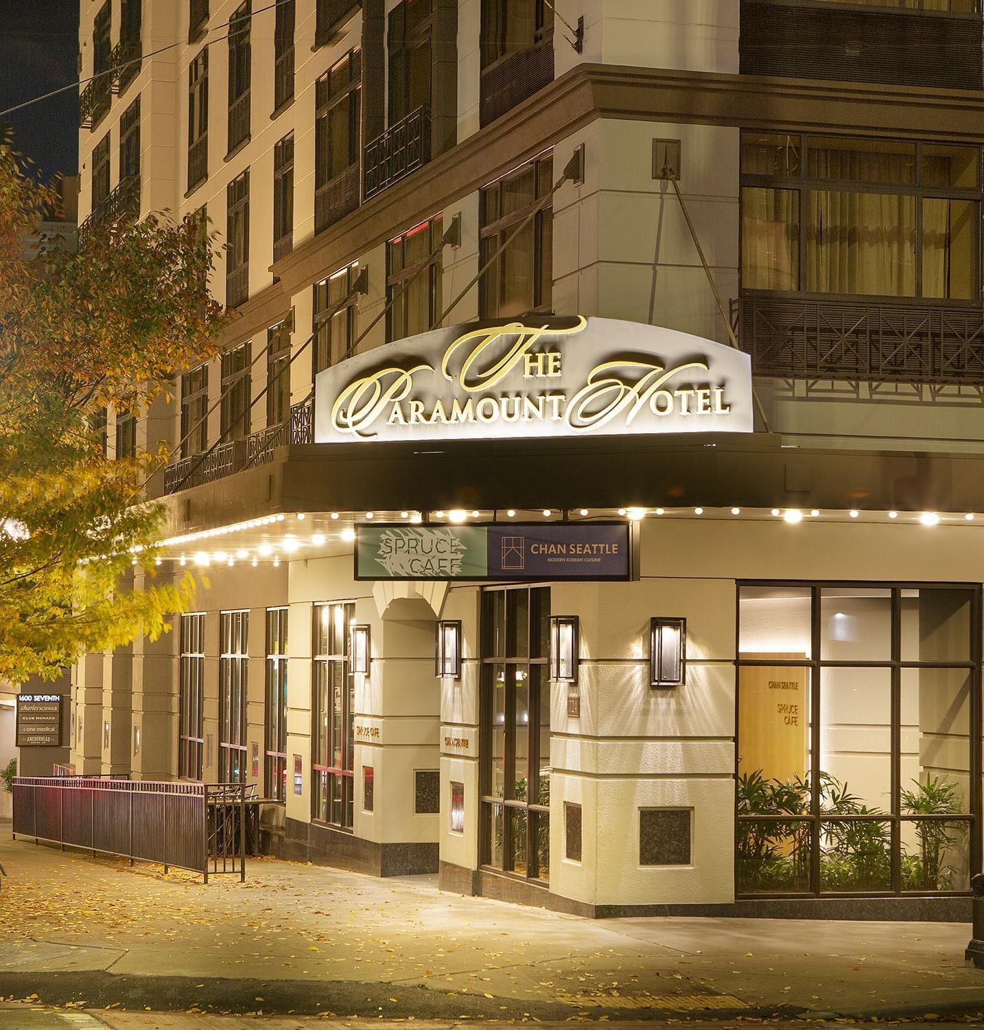 Exterior view of hotel entrance & illuminated sign at Paramount Hotel Seattle